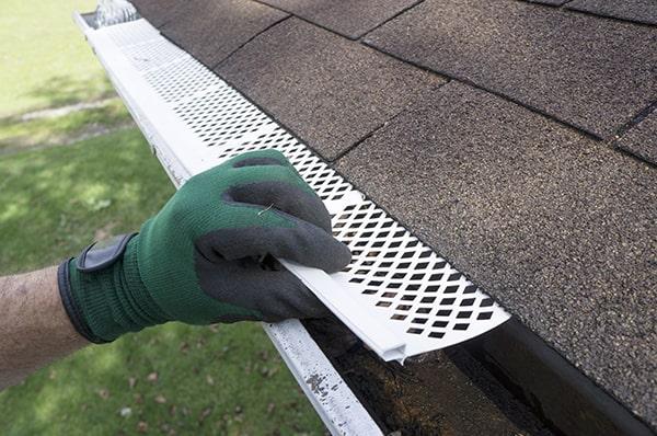 gutter guards are designed to allow water to flow freely into the gutters while keeping out leaves and debris that may hinder drainage